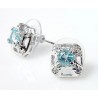 Sterling Silver Earrings with Blue Topaz and CZ